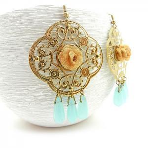 Large Gold Chandelier Earrings With Pale Blue..